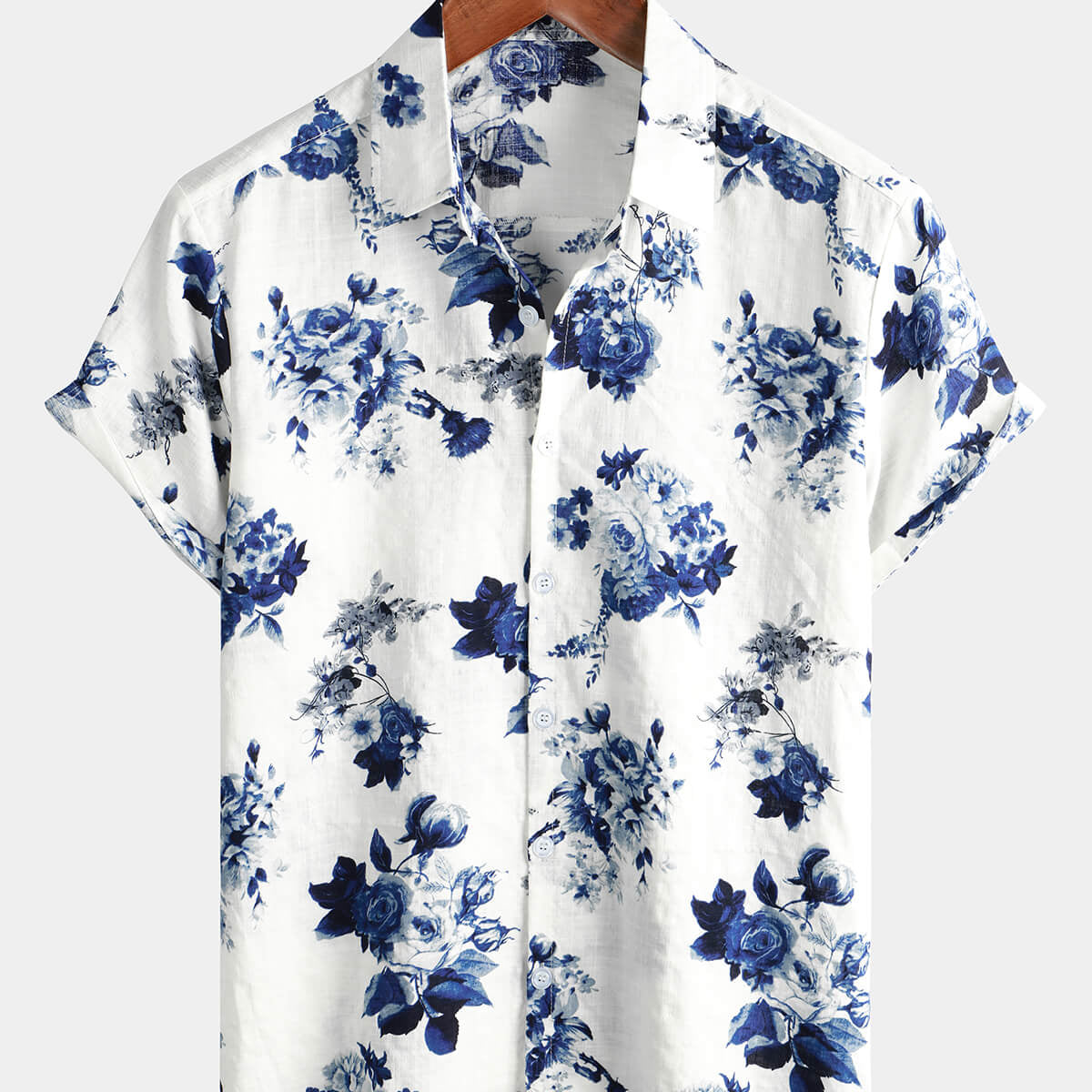 Camisa hawaiana de solapa blanca de manga corta con botones para vacaciones en la playa de algodón con estampado floral azul para hombre